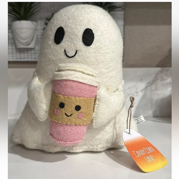 Candy Corn Lane Weighted Ghost Holding Pink Coffee Cup - Picture 1 of 3